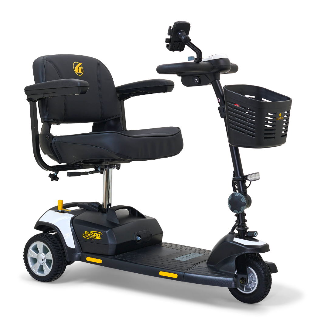 Discover the Golden Tech GB121 Buzzaround XL, a black and gray 3-wheel portable mobility scooter with a padded seat, armrests, intuitive handlebar controls, and front basket. Its compact design ensures improved maneuverability and an extended range battery perfect for personal use.